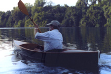 Lutra Indian Girl solo canoe under paddle