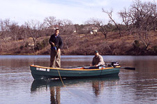 Lutra Laker outboard skiff on a lake